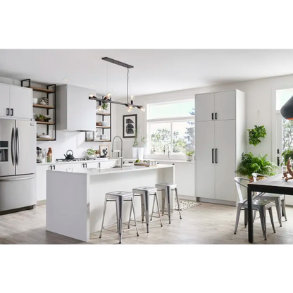 Wide view of white kitchen with Blanco Quatrus sink